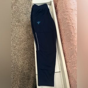 Used Navy Blue Project Rock XL Men's athletic pants. Smoke free home.